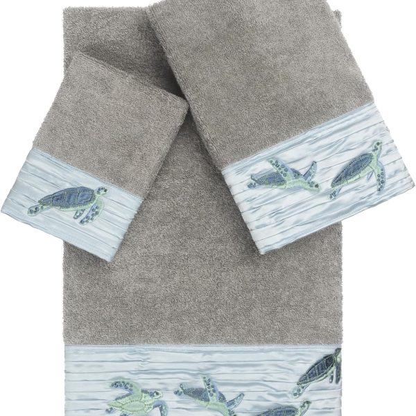 3-Piece Towel Set: Turtle-pattern design crafted from premium Turkish cotton—highly absorbent and durable; includes 1 bath towel, 1 hand towel, and 1 washcloth.